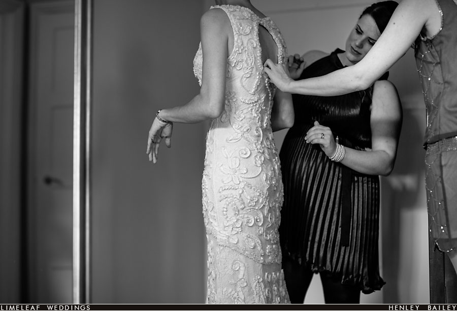 Wedding dress being fastened