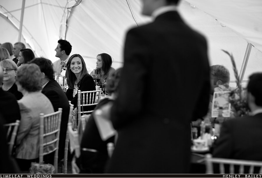 Guests smiles during wedding speeches